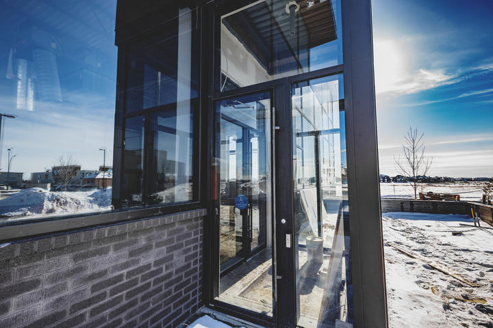 Alumicor Phantom series doors. PPG solarban 60 on grey.